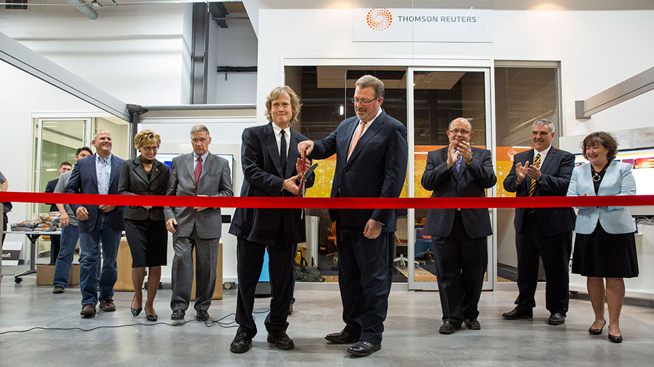 Jim Smith and David Thomson cut the ribbon at Waterloo Labs